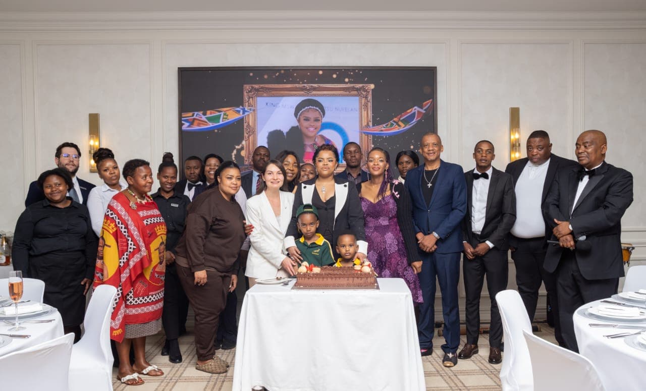 Dr. Keith Clint Harrington joining the Principal Princess and guests for a birthday group photograph